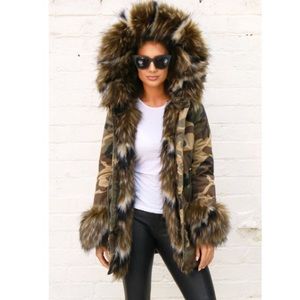 SOLD on ♏️. One Nation camo faux fur Parka